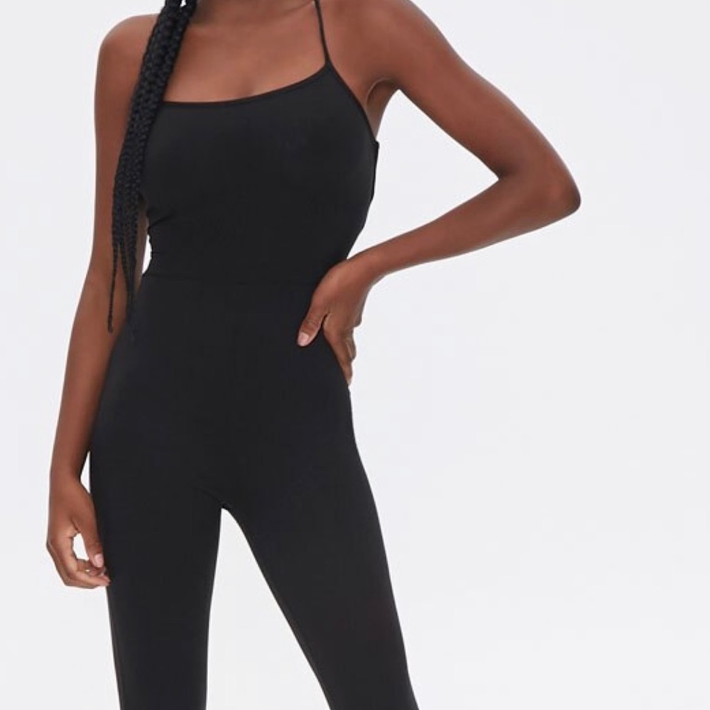 Forever 21 burgundy low cut cross back jumpsuit. Also available in black.